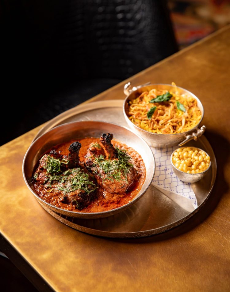 Cooked chicken on a silver platter 